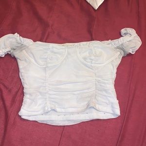 The shirt is tight fitted and the fabric is soft